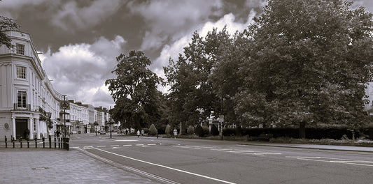 The image shows the main road Parade in Leamington Spa
